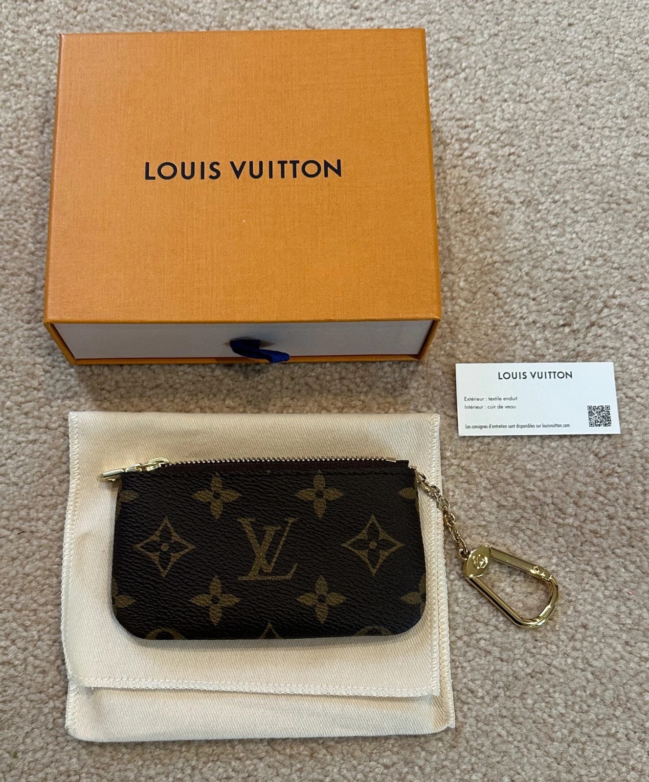 Louis Vuitton Monogram Key Pouch Brand New in Box - Image 1